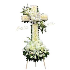 arreglo floral fúnebre con forma de cruz